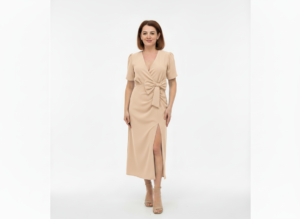 Beżowa sukienka midi z kokardą i rozcięciem